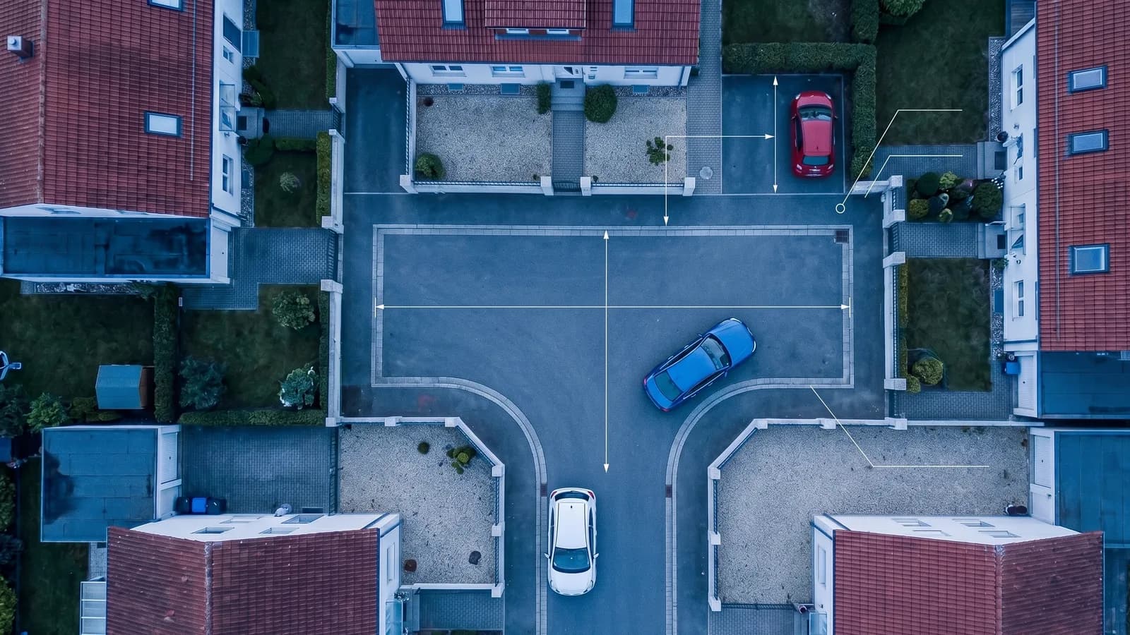 Intersection en T dans un quartier résidentiel illustrant la géométrie de retournement pour les voies en impasse